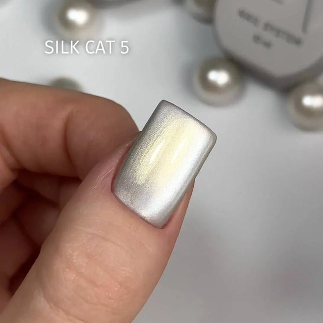 Saga Cat Eye Silk №5 cu efect de pulbere de aur 10ml